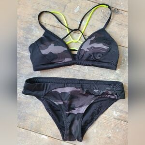Athleta 2-piece bathing suit, size XS, B cup. Camo pattern, neon yellow accent.